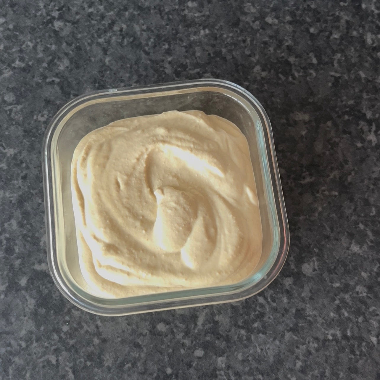 Bowl of smooth creamy hummus