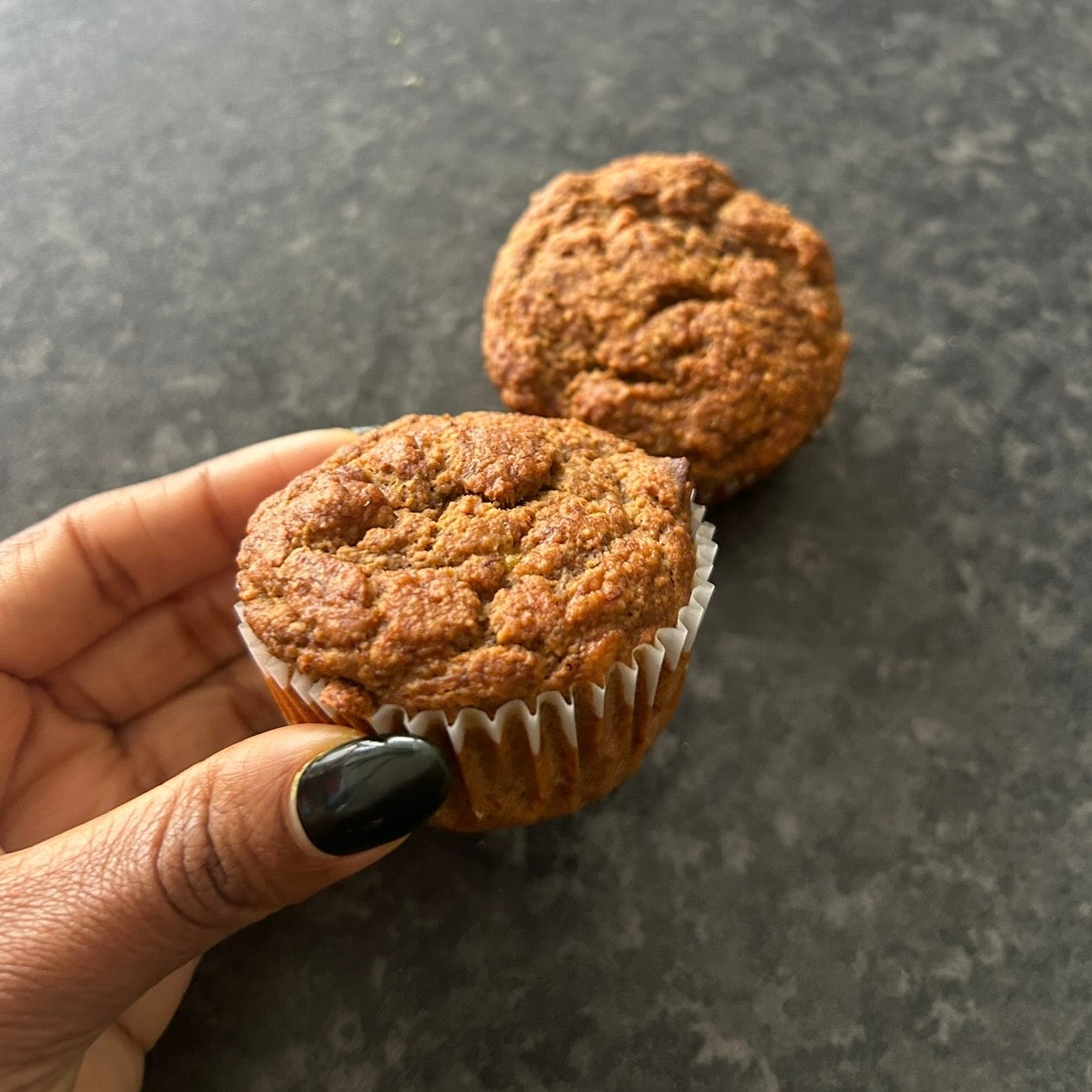 Soft vegan banana muffins made with oat flour and coconut sugar.