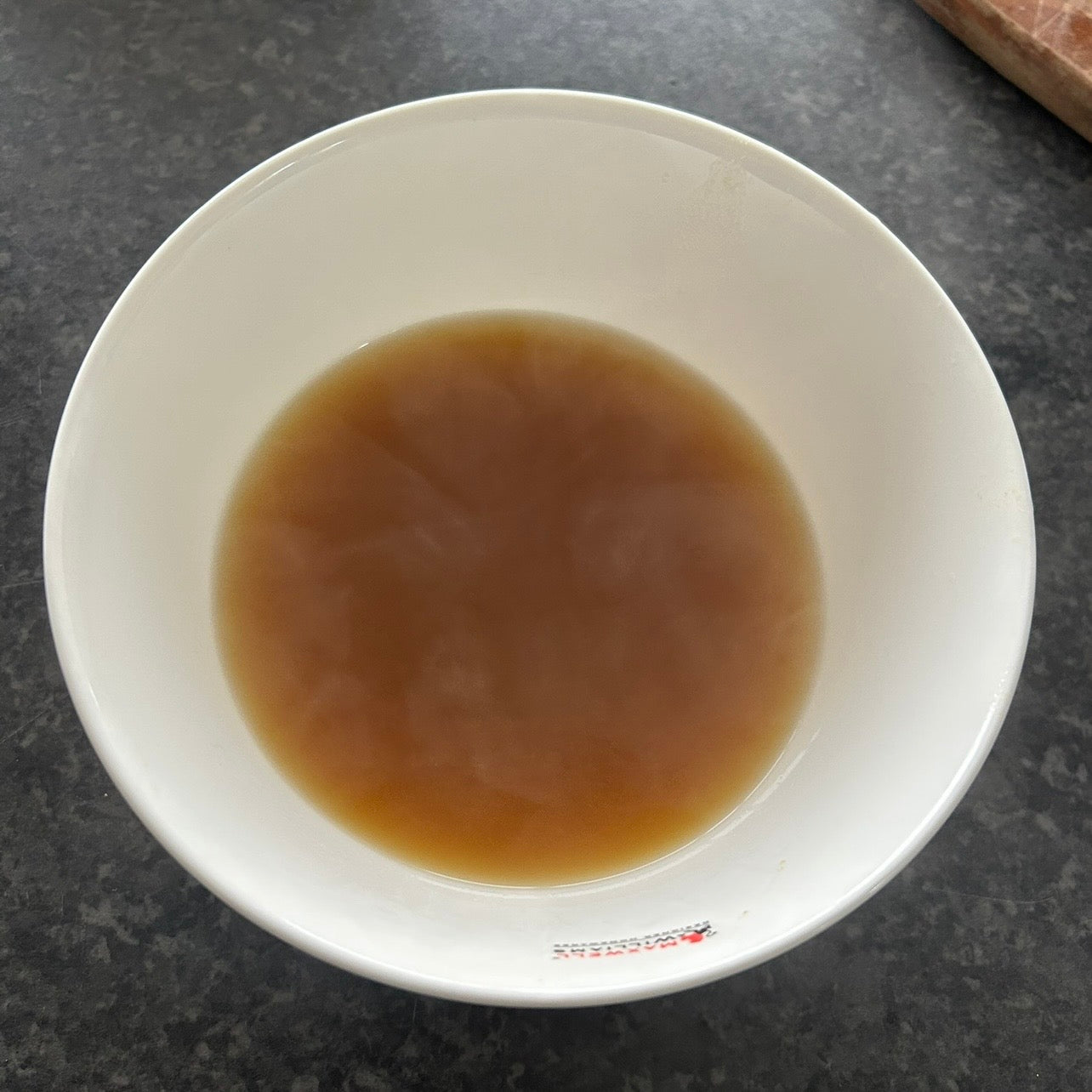Warm homemade vegetable broth with herbs, ginger and turmeric.