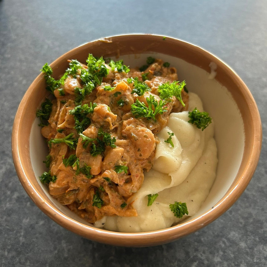 Creamy white beans with caramelised onions, herbs and coconut sauce.