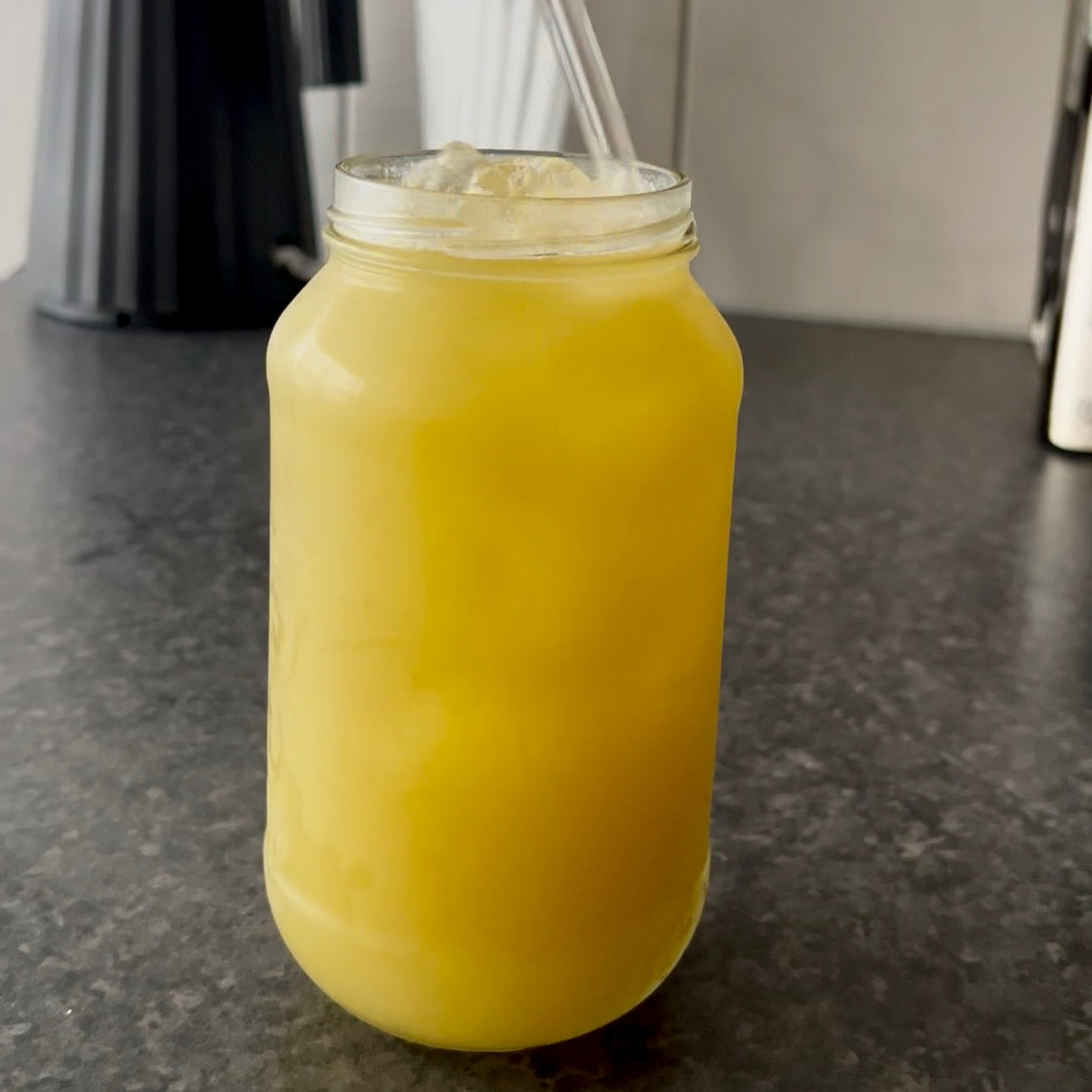 Refreshing green tea iced drink with apple juice and spearmint served over ice.